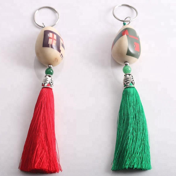 Attractive Tagua Nut keychain with your own logo,custom key chain manufacturer in China
